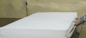 Putting the mattress in the cover