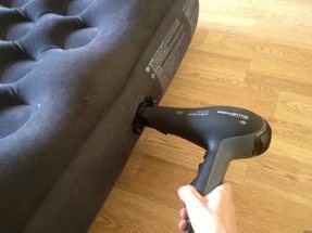 Inflate the mattress with a hairdryer