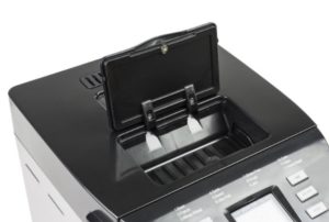 Dispenser in a bread machine