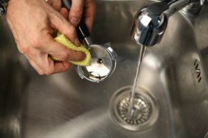 Washing the coffee machine with water