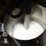 Frothing milk in a coffee machine