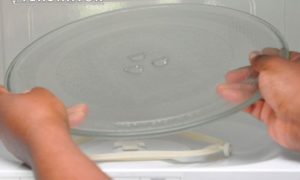 First, lift the tray if it does not spin.