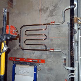 Methods for connecting a heated towel rail