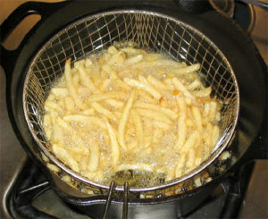 The main function of a deep fryer is frying in oil.