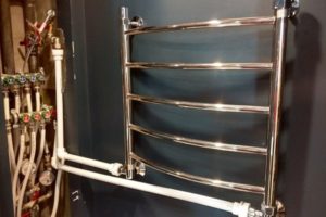 Moving a water heated towel rail