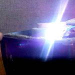 Why do the brushes in a vacuum cleaner spark?