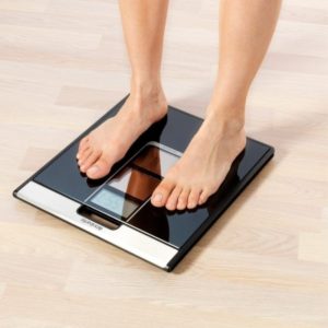 The process of setting up floor scales.