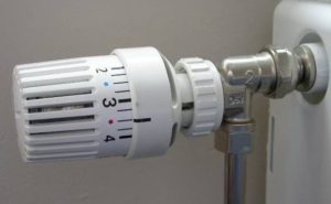 Adjusting the heat output of a heated towel rail