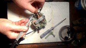 Assembling a manual coffee grinder
