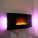 Electric fireplace with background lighting