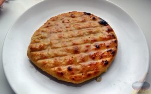 khachapuri with cheese on an electric grill