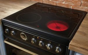 What does the power of an electric stove affect?