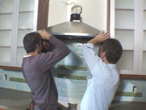 Installation of a suspended hood