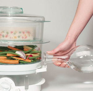 pouring water into the steamer