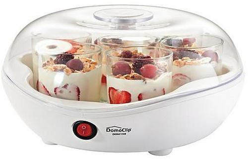 pouring ingredients into a yogurt maker