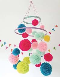 Mobile with pompoms.