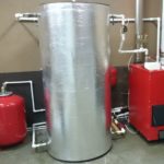 Do-it-yourself buffer tank for a solid fuel boiler.