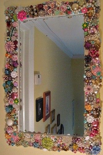 Decorating the mirror frame.