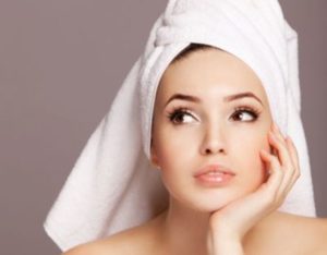 Dry your head with a towel.