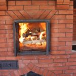 Burning wood in the stove.