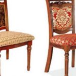 Chairs upholstered in fabric.