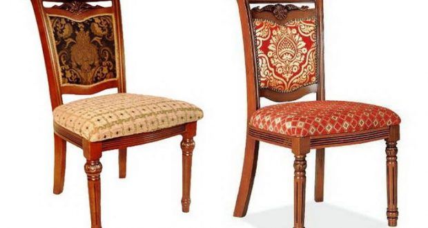 Chairs upholstered in fabric.
