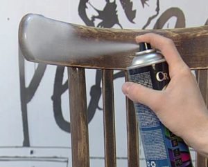 Spray painting a chair