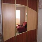 How to attach a mirror to a closet door.