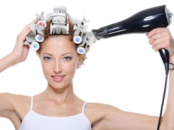 Curlers and hair dryer for curls.