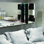 Is it possible to hang a mirror opposite the bed?