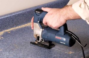 Preparing furniture for sink installation.