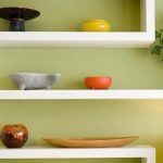 DIY plasterboard shelves on the wall.