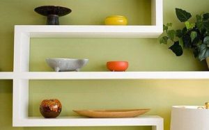 DIY plasterboard shelves on the wall.