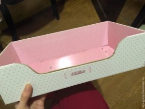 Assembling a crib from a shoe box. The penultimate step.