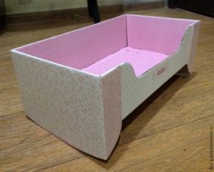 Ready-made crib for a doll from a shoebox.