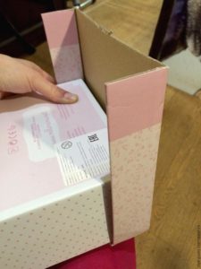 Assembling a crib from a shoe box. Step 1.