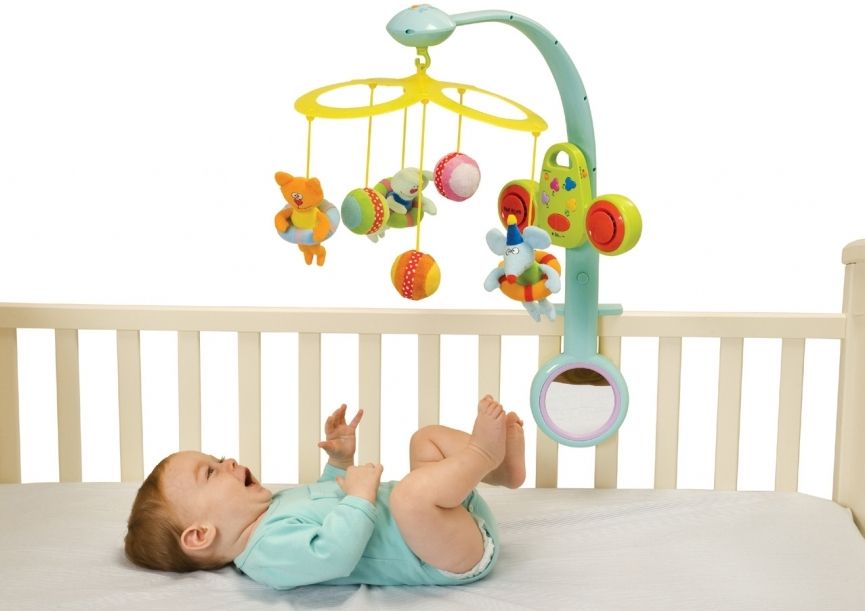 toys in a newborn's crib