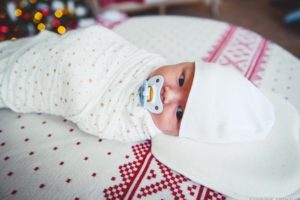 newborn on a flannel diaper