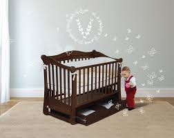 baby with crib pendulum
