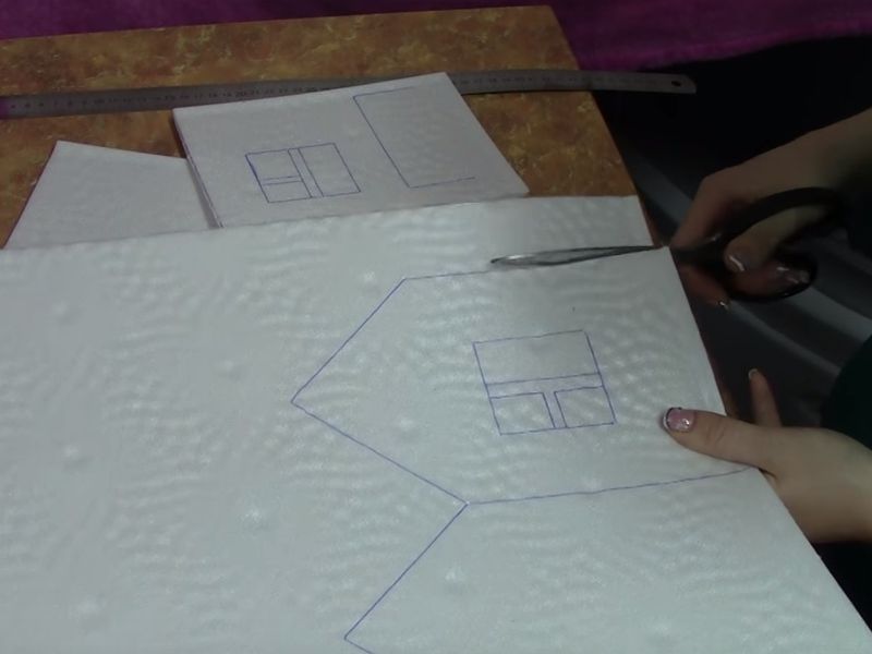 We cut out the blank for Santa Claus's house.