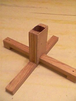Wooden cross for a Christmas tree.