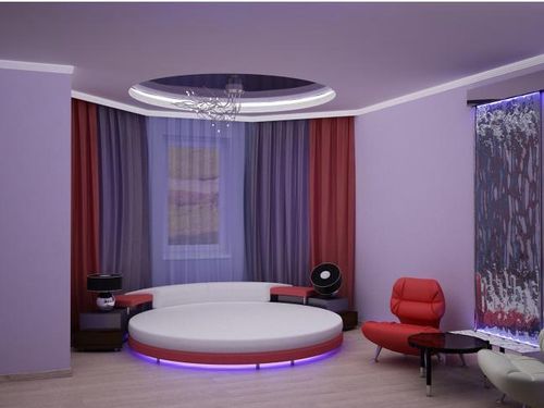 Bedroom design with a round bed