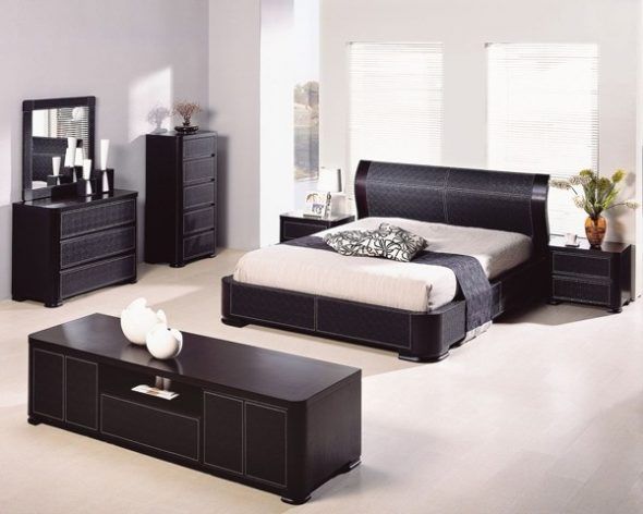 Bedroom design with dark furniture