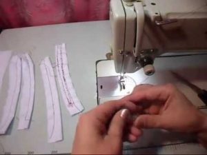 Thread tension in a sewing machine