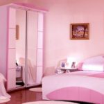 Furniture in a pink bedroom.