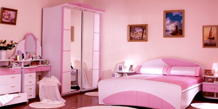 Furniture in a pink bedroom.