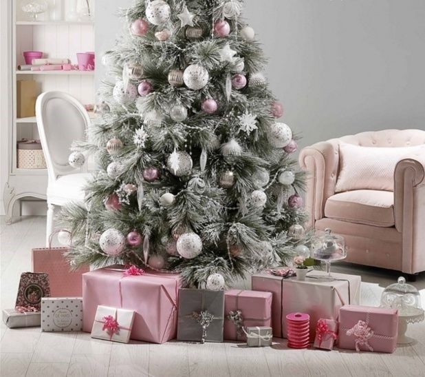 New Year's tree in white and pink decor and interior.
