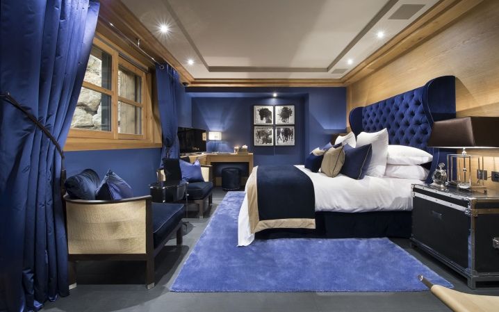 Bedroom lighting with blue bed.