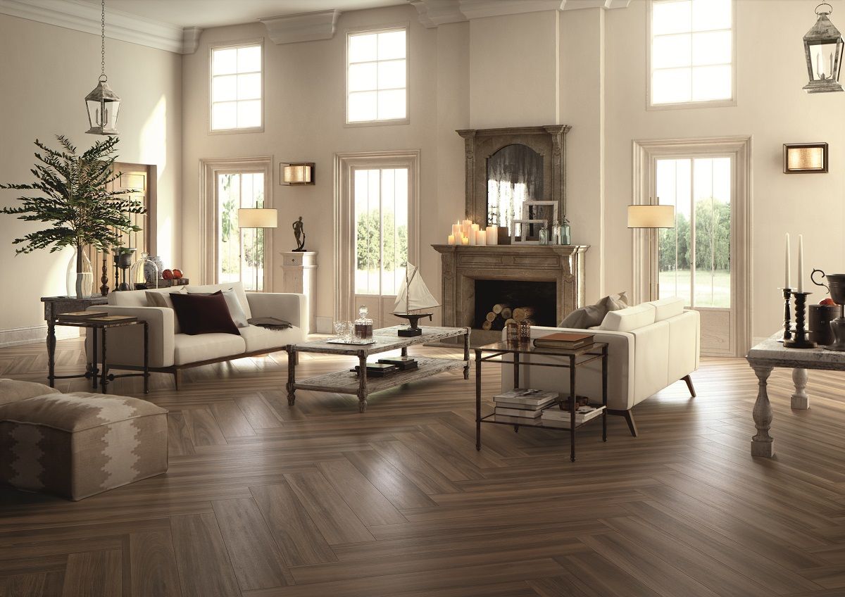 Laying laminate in a herringbone pattern in the interior.