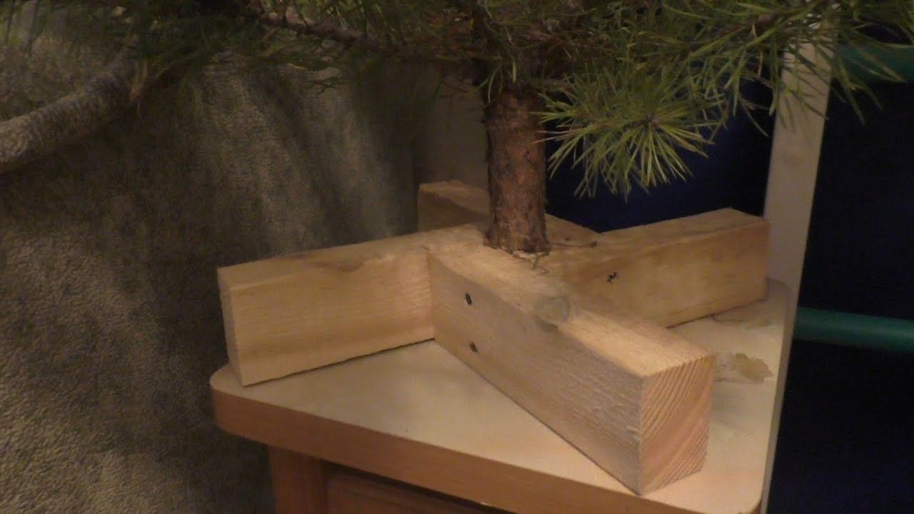 DIY Christmas tree stand made of wood.